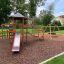 Six Angle with Suspension Bridge single slide ensemble de jeux dans un parc avec surface en paillis