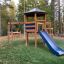 Structure de jeu Six Angle with Suspension Bridge single slide dans un parc.