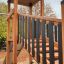 Structure de terrain de jeu en bois avec toboggan nommée Explorer castle with slide.