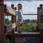 Enfant jouant sur un Gigantic castle with slide en bois