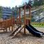 Smart Modern Nature wooden playhouse with slide en extérieur