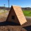 alt=Structure de jeu en bois Small House dans un parc