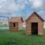 Maisons de jeu extérieures Nature Playhouse en bois avec des balançoires en arrière-plan.