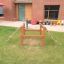 Structure d’escalade en bois Trapezoidal pour enfants dans un jardin