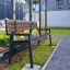 Oxford Bench extérieur dans un cadre de jardin moderne.