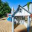 Aire de jeux pour enfants avec Nill's Playhouse.