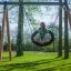 Bird Nest Swing with Tower (BNS 90 cm) playhouse with slide dans un jardin