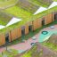 Round trampoline (150 cm) sur une surface de terrain de jeu moderne avec des éléments de jeu géométriques