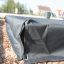 Sandbox cover 3m x 3m fixé avec une sangle dans un parc.